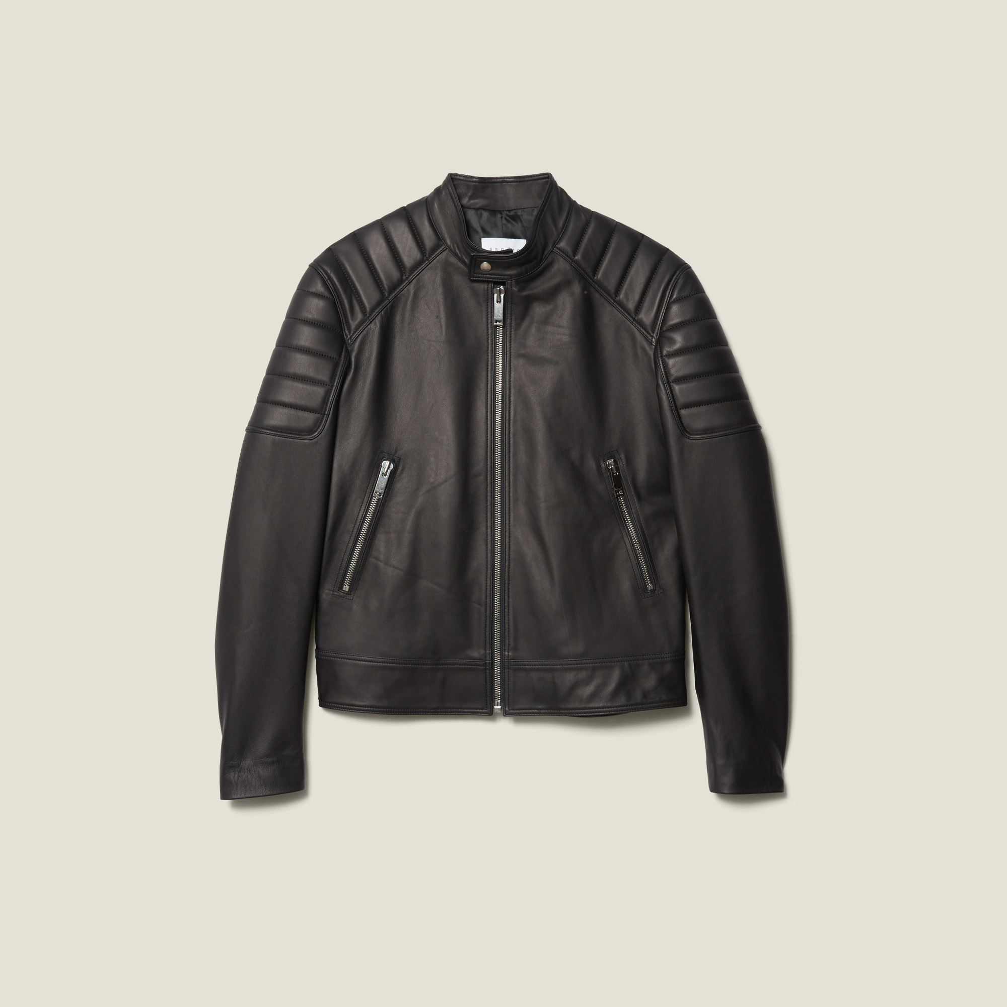 Blouson en cuir finitions matelassées