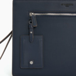 Pochette 13 Emile en cuir signature T