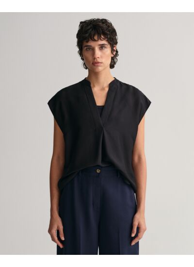 Blouse sans manches à col montant